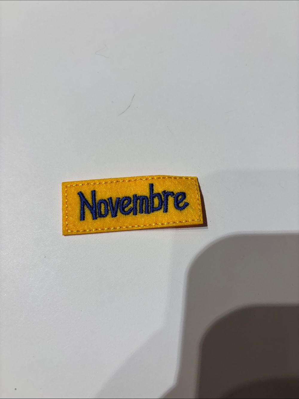 Yellow 'Novembre' Embroidered Patch - Blue Lettering